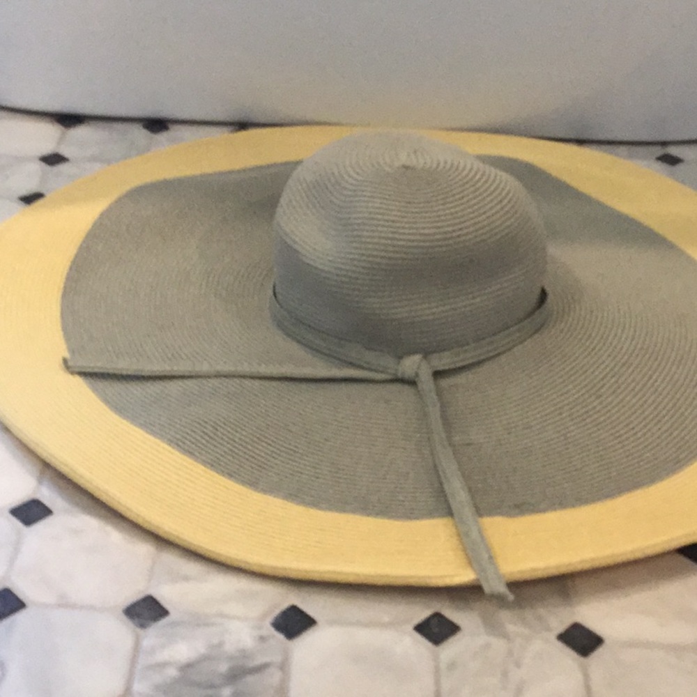 Gray and cream colored hat